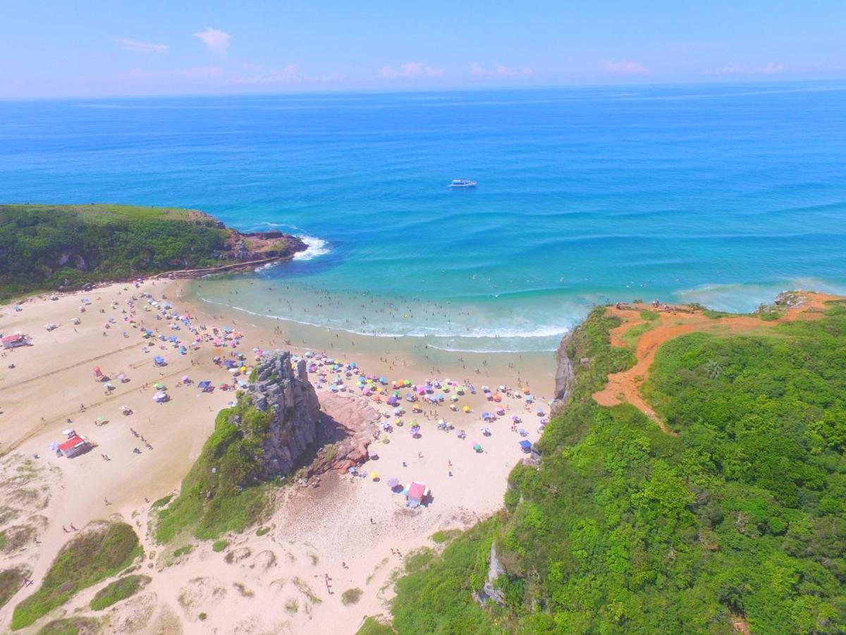 CASA completa em TORRES-RS - O MELHOR CUSTO BENEFICIO na mais bela praia Gaúcha - Cozinha - Banheiro - Ar condicionado - Smart TV 32 Android Apps Youtube - Netflix - Prime Vídeo e Wi-Fi - Estacionamento - Acomoda até 10 pessoas - Anfitriã Superhost n Vila Exterior foto