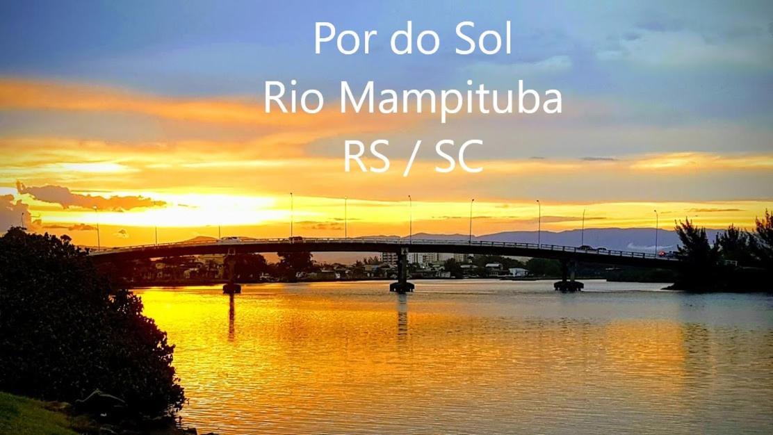 CASA completa em TORRES-RS - O MELHOR CUSTO BENEFICIO na mais bela praia Gaúcha - Cozinha - Banheiro - Ar condicionado - Smart TV 32 Android Apps Youtube - Netflix - Prime Vídeo e Wi-Fi - Estacionamento - Acomoda até 10 pessoas - Anfitriã Superhost n Vila Exterior foto
