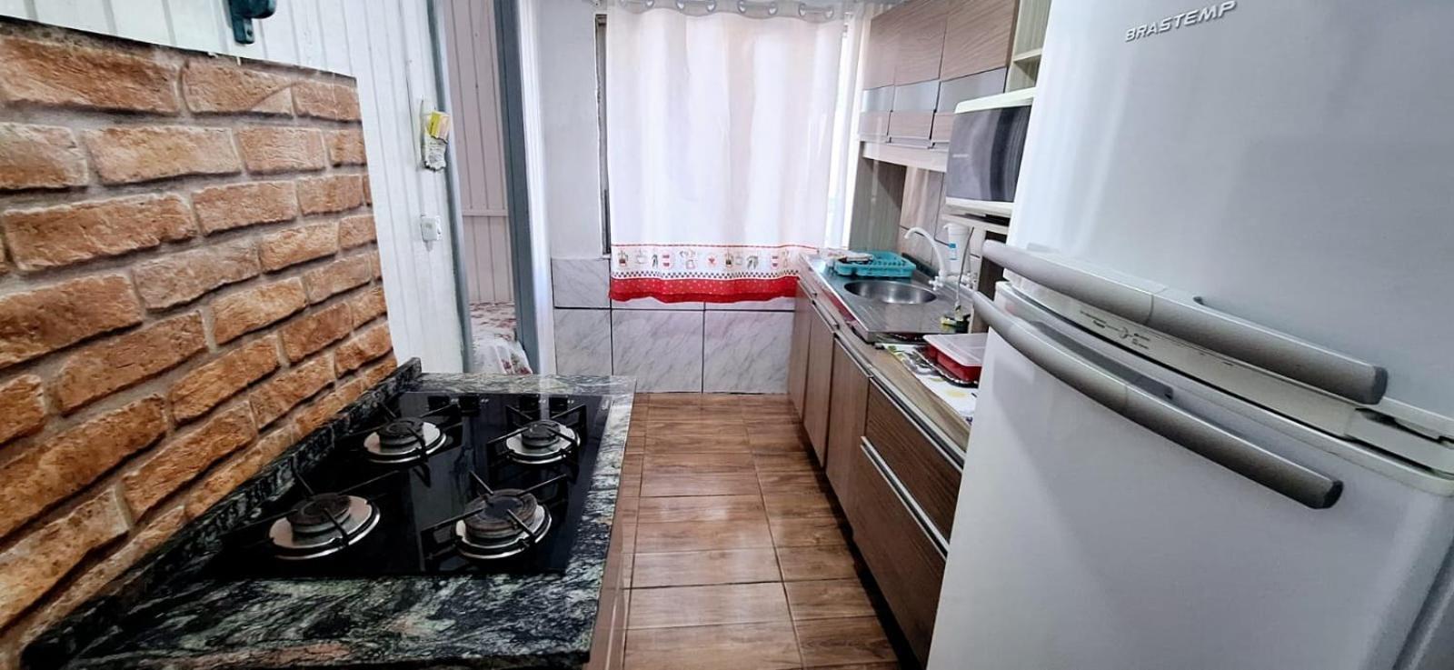 CASA completa em TORRES-RS - O MELHOR CUSTO BENEFICIO na mais bela praia Gaúcha - Cozinha - Banheiro - Ar condicionado - Smart TV 32 Android Apps Youtube - Netflix - Prime Vídeo e Wi-Fi - Estacionamento - Acomoda até 10 pessoas - Anfitriã Superhost n Vila Exterior foto
